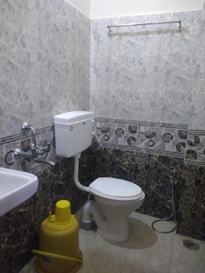 Addhuri Comforts Inn Maiçor Quarto foto